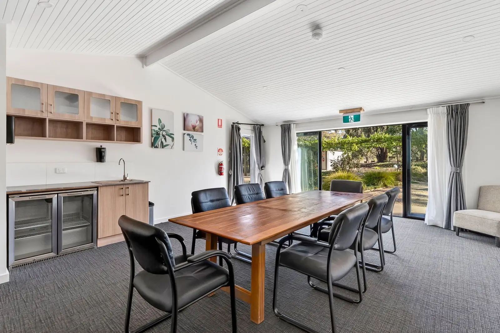 The Homestead conference room with a long timber table