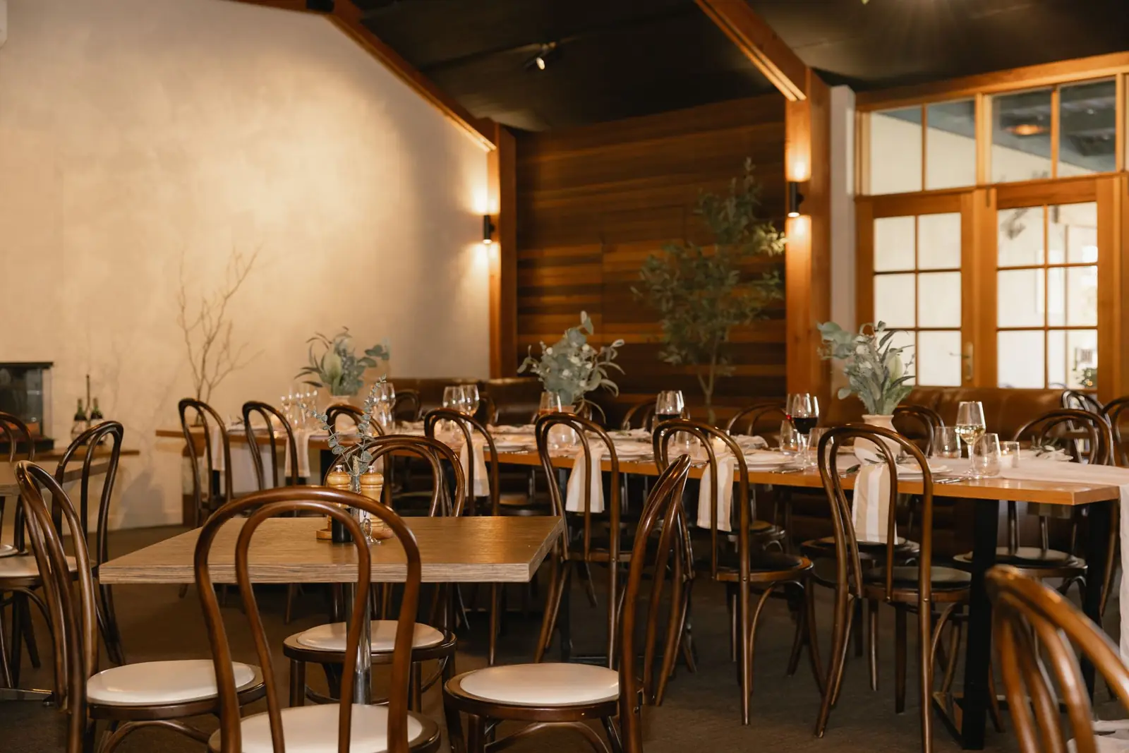 The dining room set for service